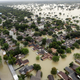 Water from Addicks Reservoir flows into neighborhoods as floodwaters from Tropical Storm Harvey rise August, 29, 2017, in Houston. (AP Photo/David J. Phillip)